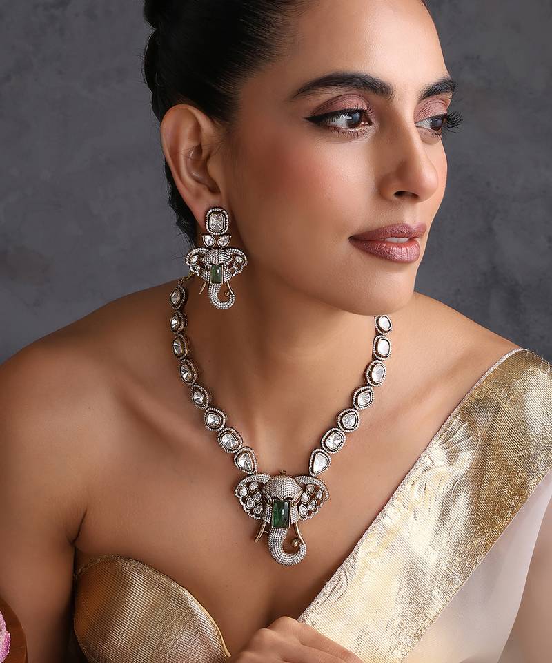 Gold plated emerald green polki pendant necklace set