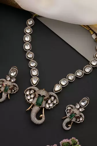 Gold plated emerald green polki pendant necklace set