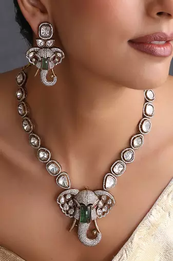 Gold plated emerald green polki pendant necklace set