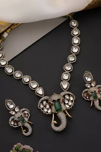 Gold plated emerald green polki pendant necklace set