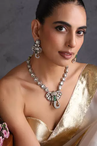 Gold plated emerald green polki pendant necklace set