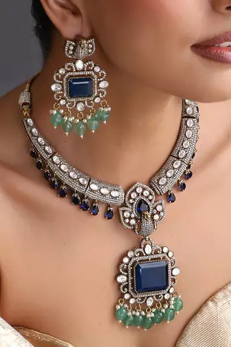 Gold plated sapphire blue polki necklace set