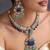 Gold plated sapphire blue polki necklace set