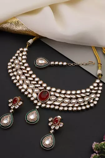 Gold plated ruby red polki necklace set with maang tikka