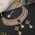Gold plated ruby red polki necklace set with maang tikka