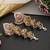 Gold plated red jadau jhumka earrings