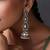 Green polki dangler jhumka earrings