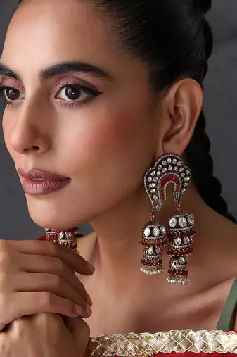 Gold plated red polki jhumka earrings