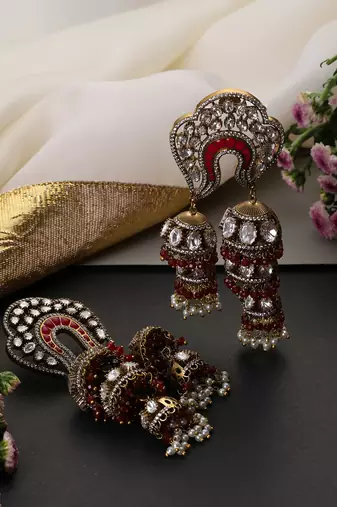 Gold plated red polki jhumka earrings