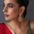Gold plated ruby red kundan jhumka earrings