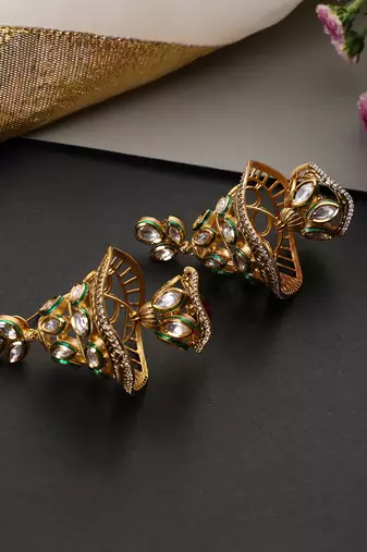 Gold plated ruby red kundan jhumka earrings