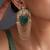 Gold plated emerald green polki dangler earrings