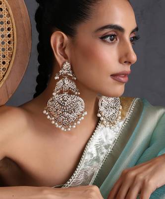 Gold plated white jadau dangler earrings 1