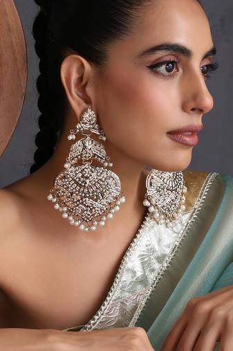 Gold plated white jadau dangler earrings