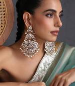 Gold plated white jadau dangler earrings