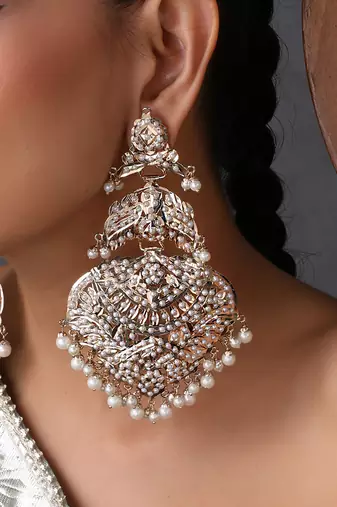 Gold plated white jadau dangler earrings