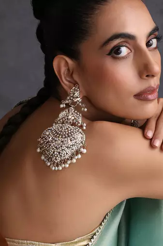Gold plated white jadau dangler earrings