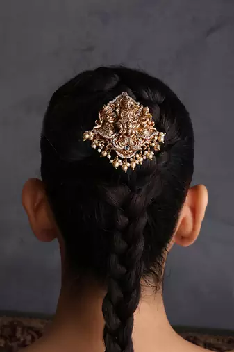 Gold plated ruby red temple motif hair pin