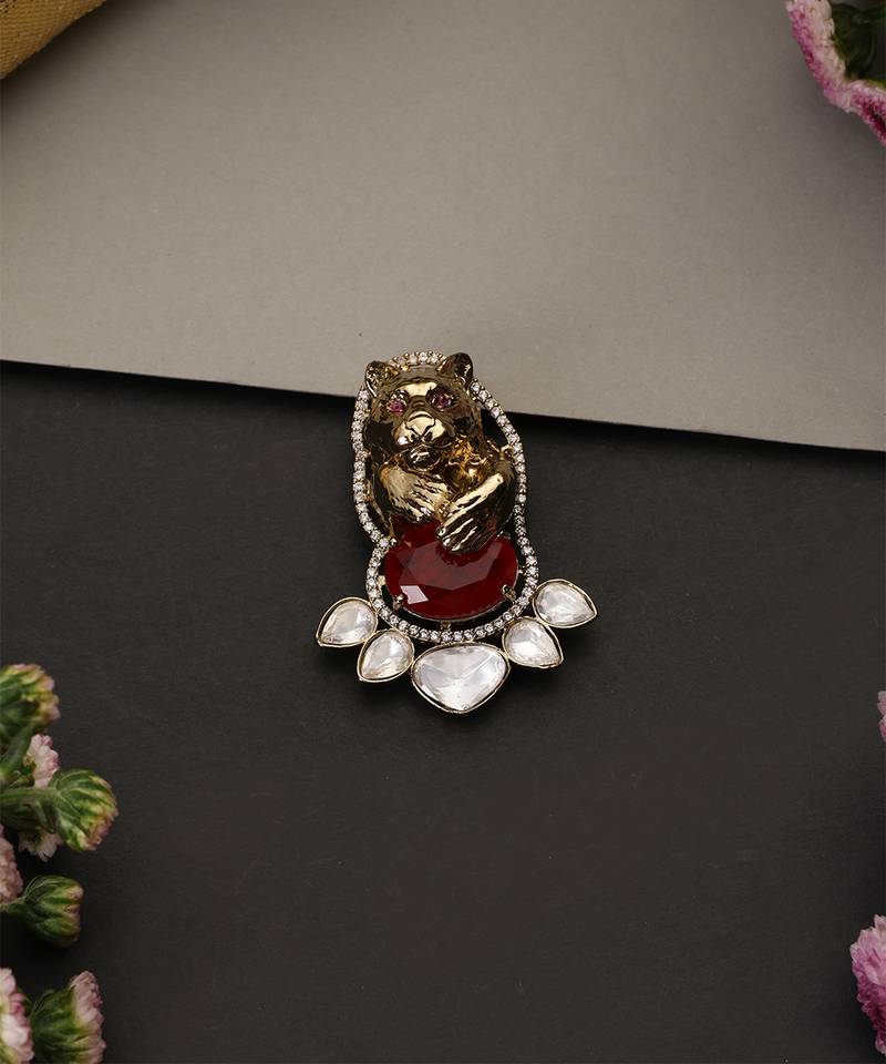 Gold plated ruby red polki brooch
