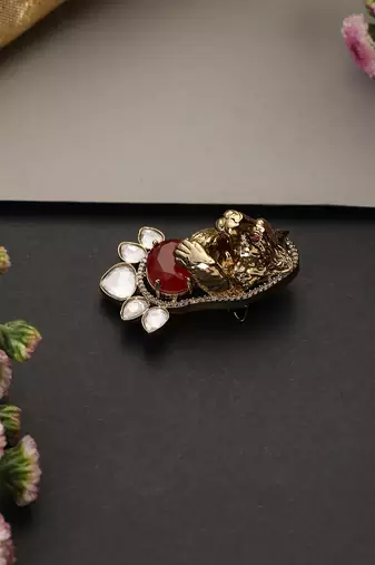 Gold plated ruby red polki brooch