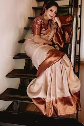 Beige wine silk blend jacuard work festival saree with unstitched blouse piece