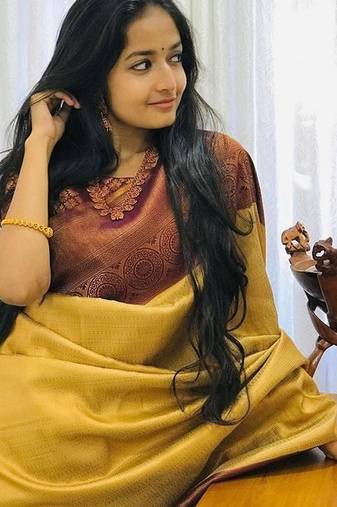 Mustard brown silk blend jacuard work festival saree with unstitched blouse piece