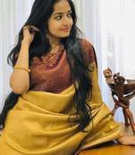 Mustard brown silk blend jacuard work festival saree with unstitched blouse piece