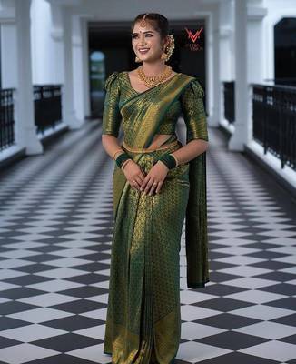 Green silk blend jacuard work festival saree with unstitched blouse piece 1
