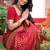 Red silk blend jacuard work festival saree with unstitched blouse piece