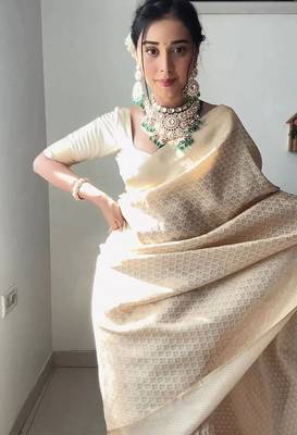 Off white silk blend jacuard work festival saree with unstitched blouse piece 1