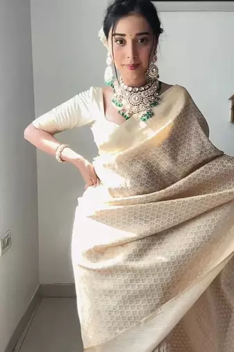 Off white silk blend jacuard work festival saree with unstitched blouse piece
