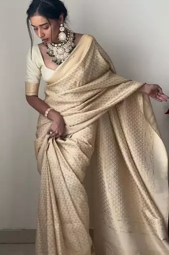 Off white silk blend jacuard work festival saree with unstitched blouse piece