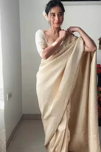 Off white silk blend jacuard work festival saree with unstitched blouse piece