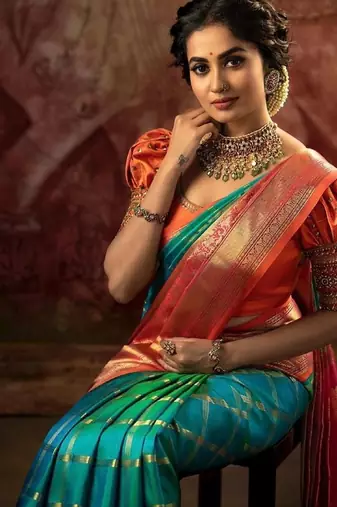 Turuoise red silk blend jacuard work festival saree with unstitched blouse piece
