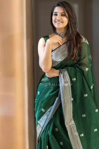 Green silk blend jacuard work festival saree with unstitched blouse piece