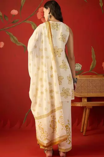 off-white floral printed   cotton stitched sleeveless straight trouser salwar suit set