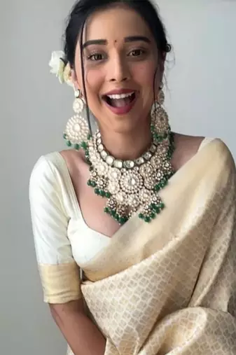 Off white silk blend jacuard work festival saree with unstitched blouse piece