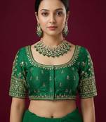 Green embroidered traditional saree blouse