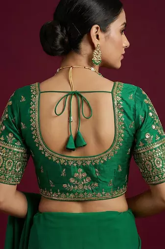 Green embroidered traditional saree blouse