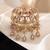 Gold-plated twin horse rider brooch for men