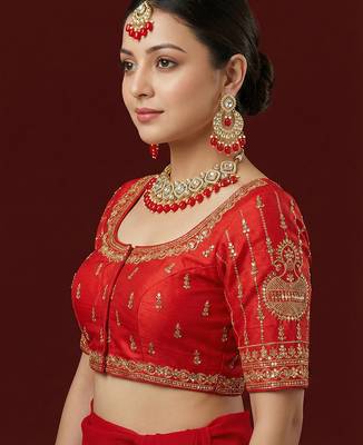 Red embroidered traditional saree blouse 2