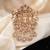 Gold finish gold stone detailing traditional brooch for men