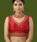 Red embroidered traditional saree blouse