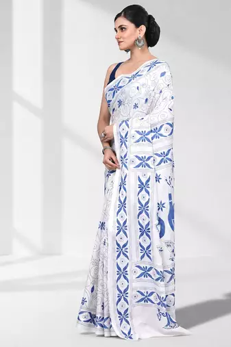 White silk blend kantha stitch saree with peacock & floral motifs
