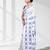 White silk blend kantha stitch saree with peacock & floral motifs
