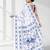 White silk blend kantha stitch saree with peacock & floral motifs