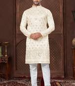 Cream colour kurta pajama set with zari embroidery & fancy buttons