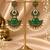 Gold oxidized green stone chandbali earrings