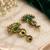Gold oxidized green stone chandbali earrings