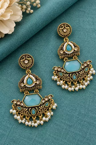 Gold oxidized sky blue stone chandbali earrings
